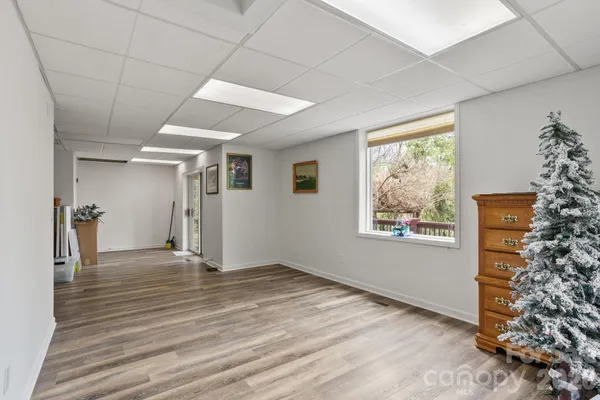 a view of an empty room with a window