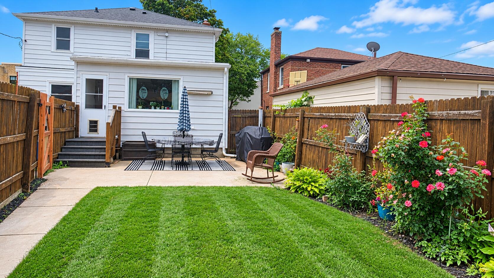 2624 Mitchell Street Racine, WI 53403 - Photo 2 of 29 Fence with patio