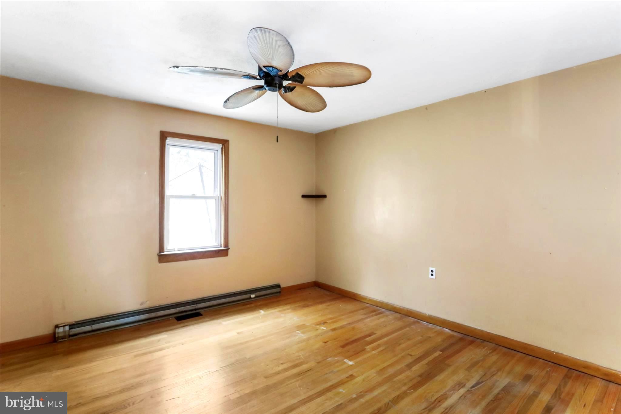 571 Martinsburg Road Berkeley Springs, WV 25411 - Photo 13 of 36 upper level bedroom