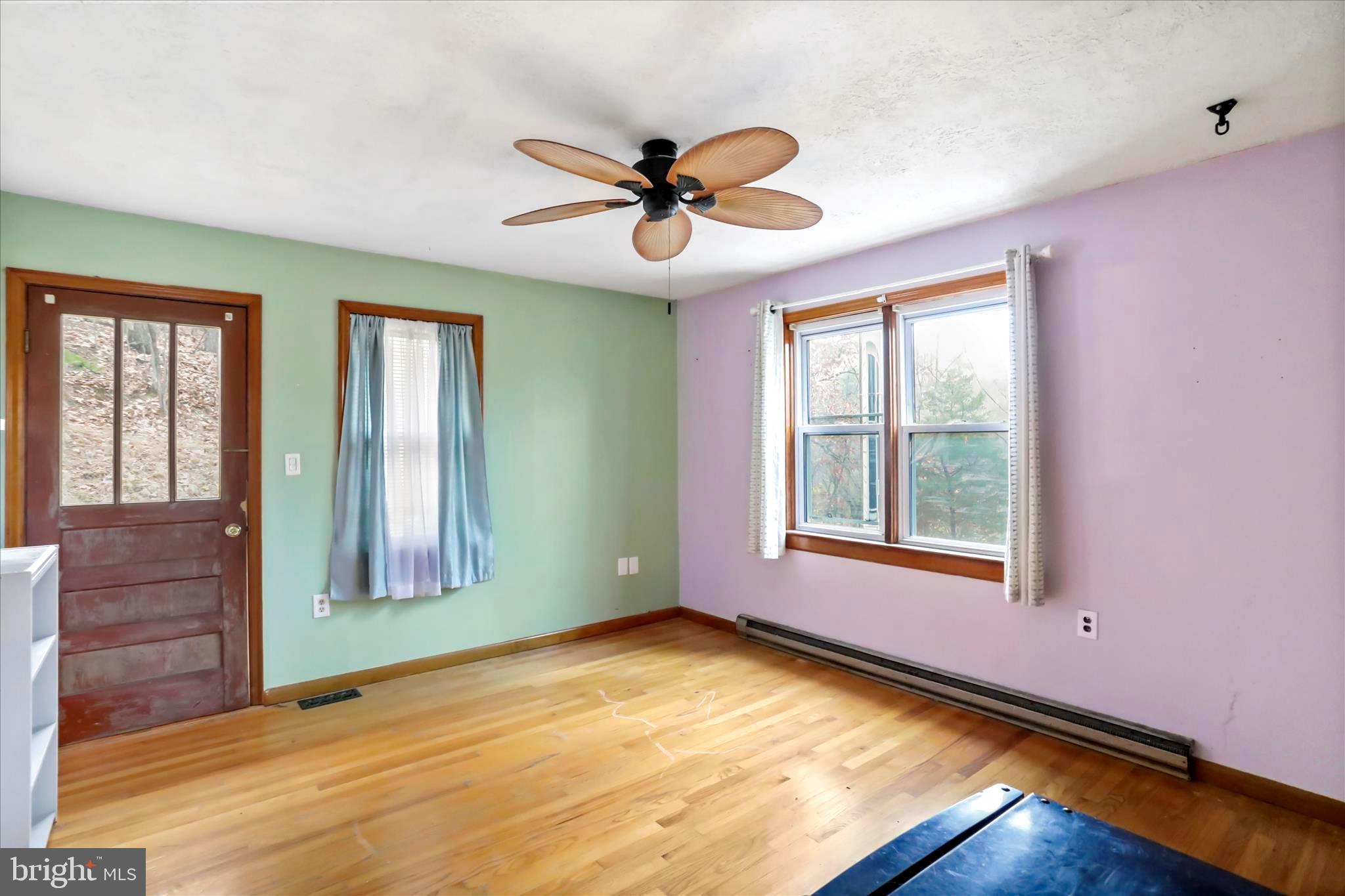 571 Martinsburg Road Berkeley Springs, WV 25411 - Photo 19 of 36 upper level bedroom