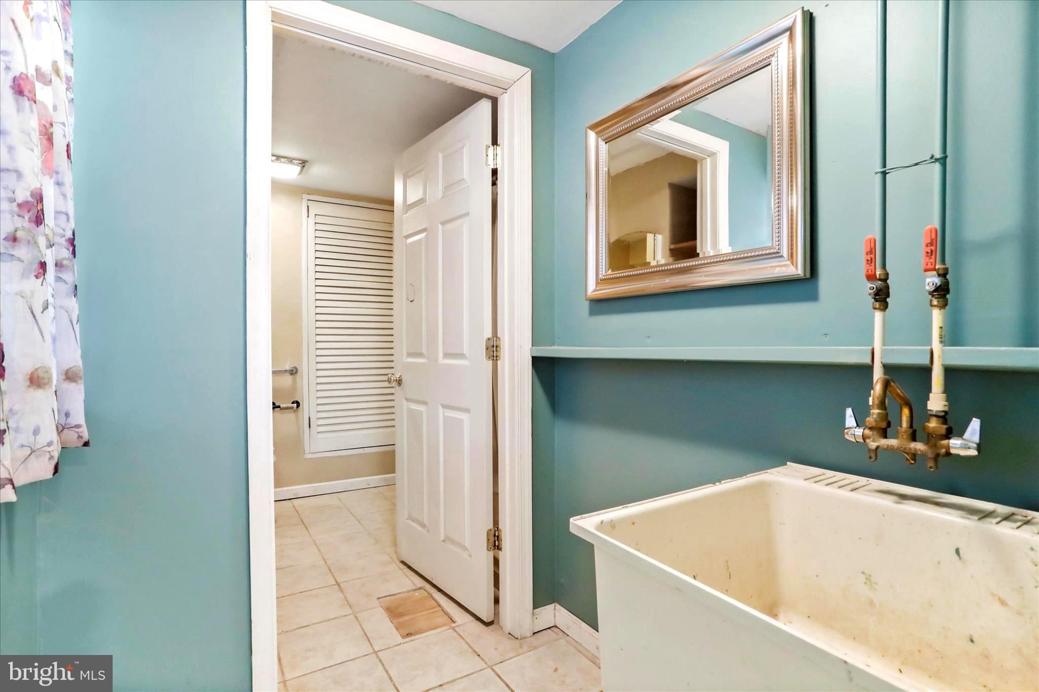 571 Martinsburg Road Berkeley Springs, WV 25411 - Photo 33 of 36 lower level mop sink