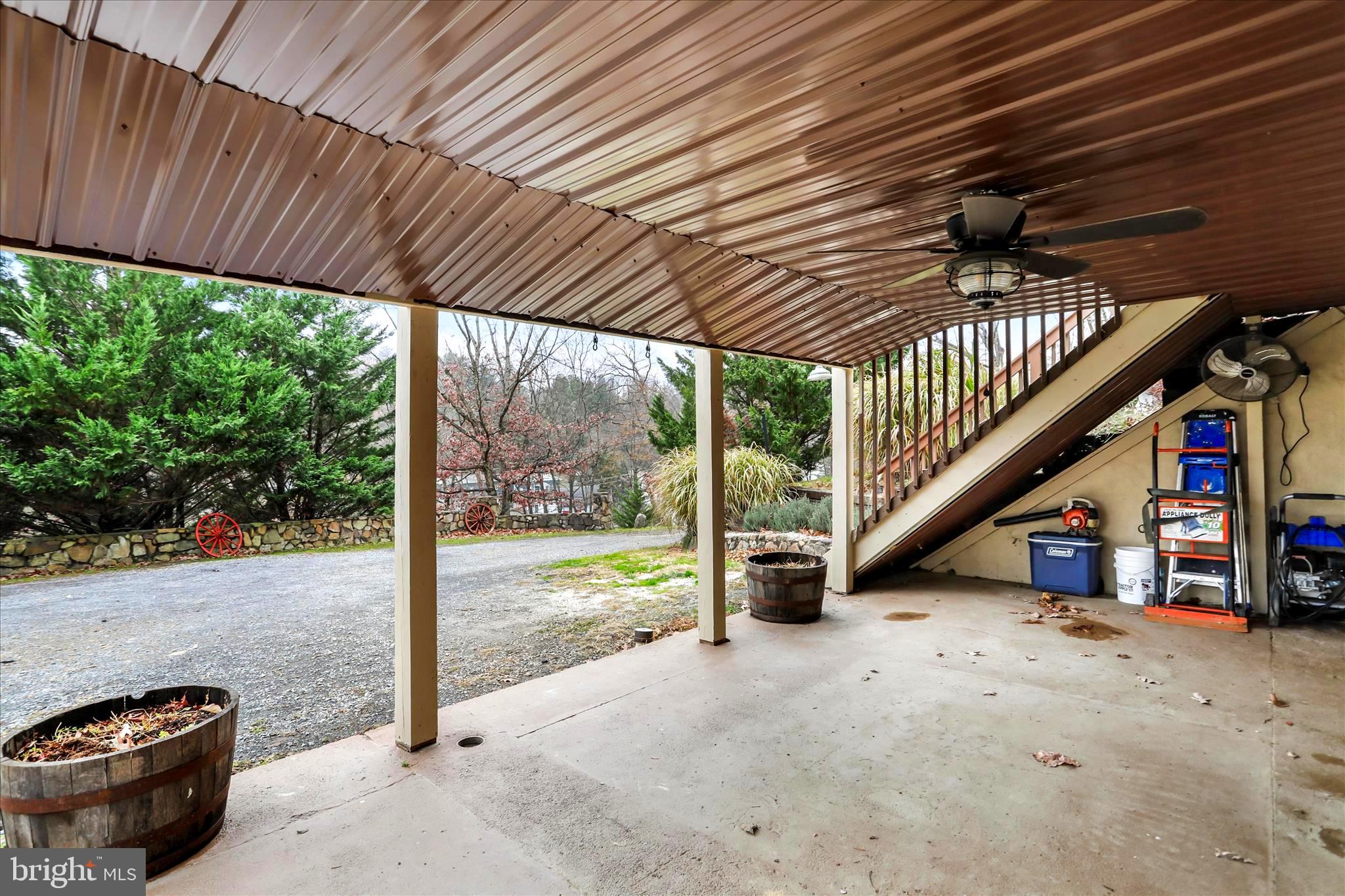 571 Martinsburg Road Berkeley Springs, WV 25411 - Photo 5 of 36 Walk in to the lower level. Under the front deck.