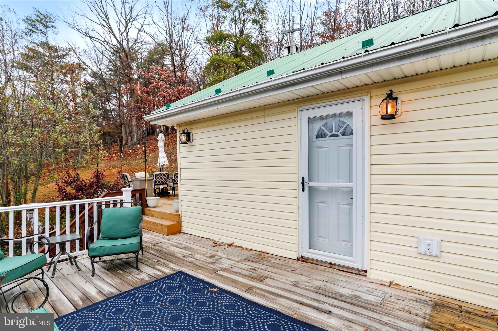 571 Martinsburg Road Berkeley Springs, WV 25411 - Photo 6 of 36 Front Door from the upper deck