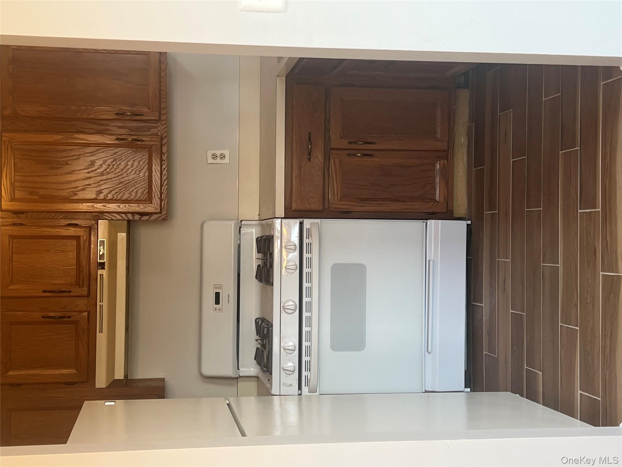 21 Lexington Hills Road, Unit 6 Harriman, NY 10926 - Photo 1 of 9 a stove top oven sitting inside of a kitchen