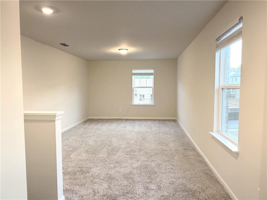 6901 Durham Lane Fairburn, GA 30213 - Photo 12 of 29 an empty room with windows