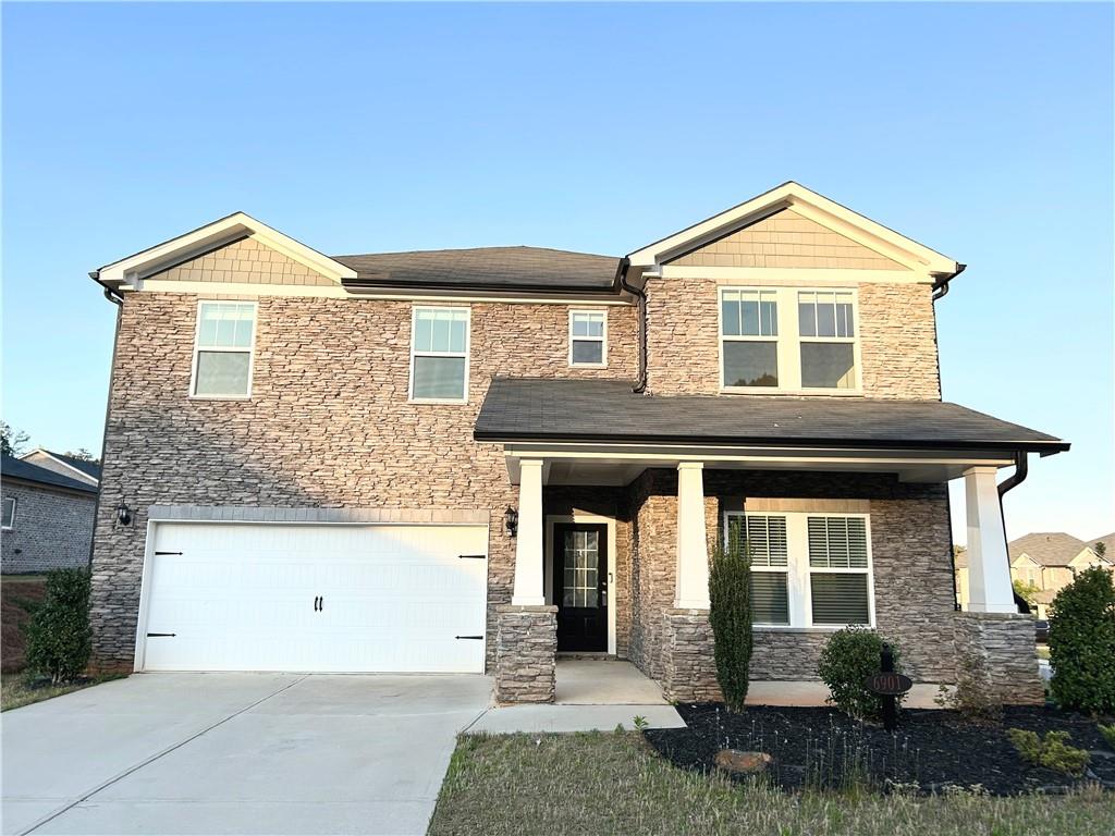6901 Durham Lane Fairburn, GA 30213 - Photo 2 of 29 a front view of a house with garden