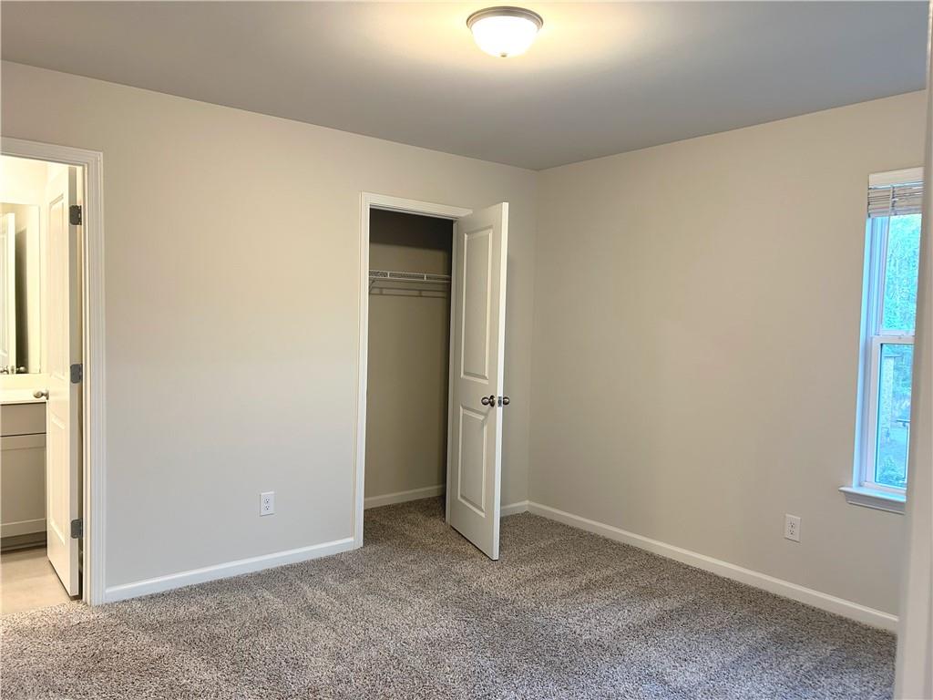 6901 Durham Lane Fairburn, GA 30213 - Photo 21 of 29 an empty room with windows