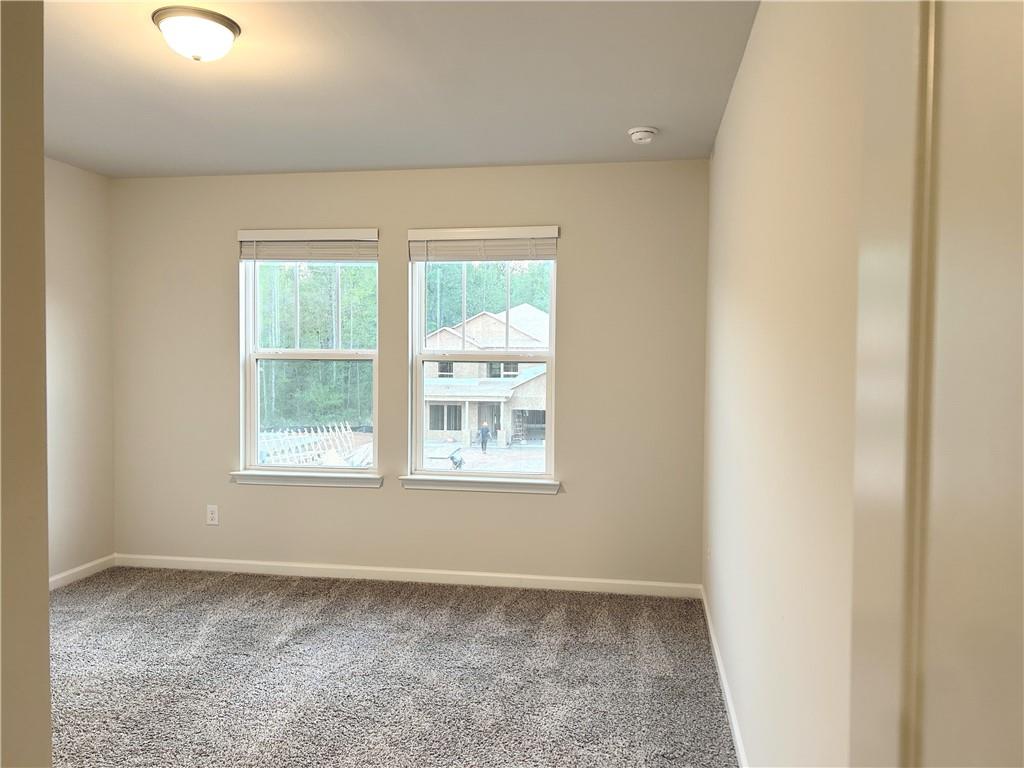 6901 Durham Lane Fairburn, GA 30213 - Photo 23 of 29 an empty room with a window