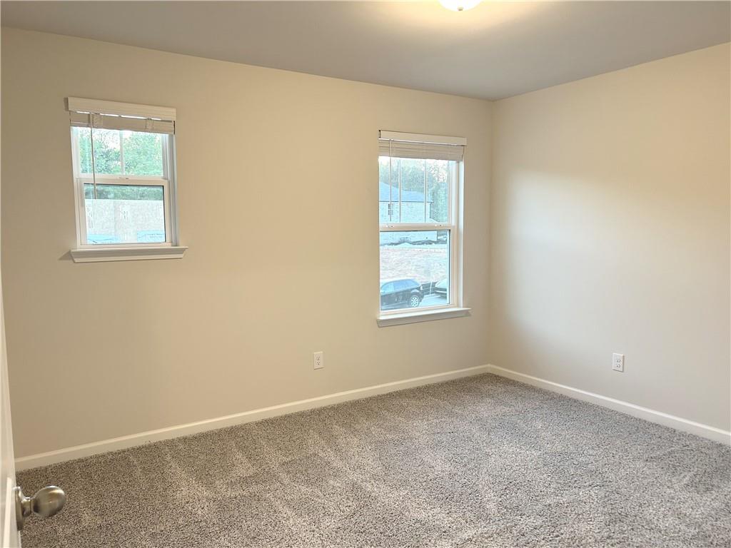 6901 Durham Lane Fairburn, GA 30213 - Photo 24 of 29 an empty room with windows