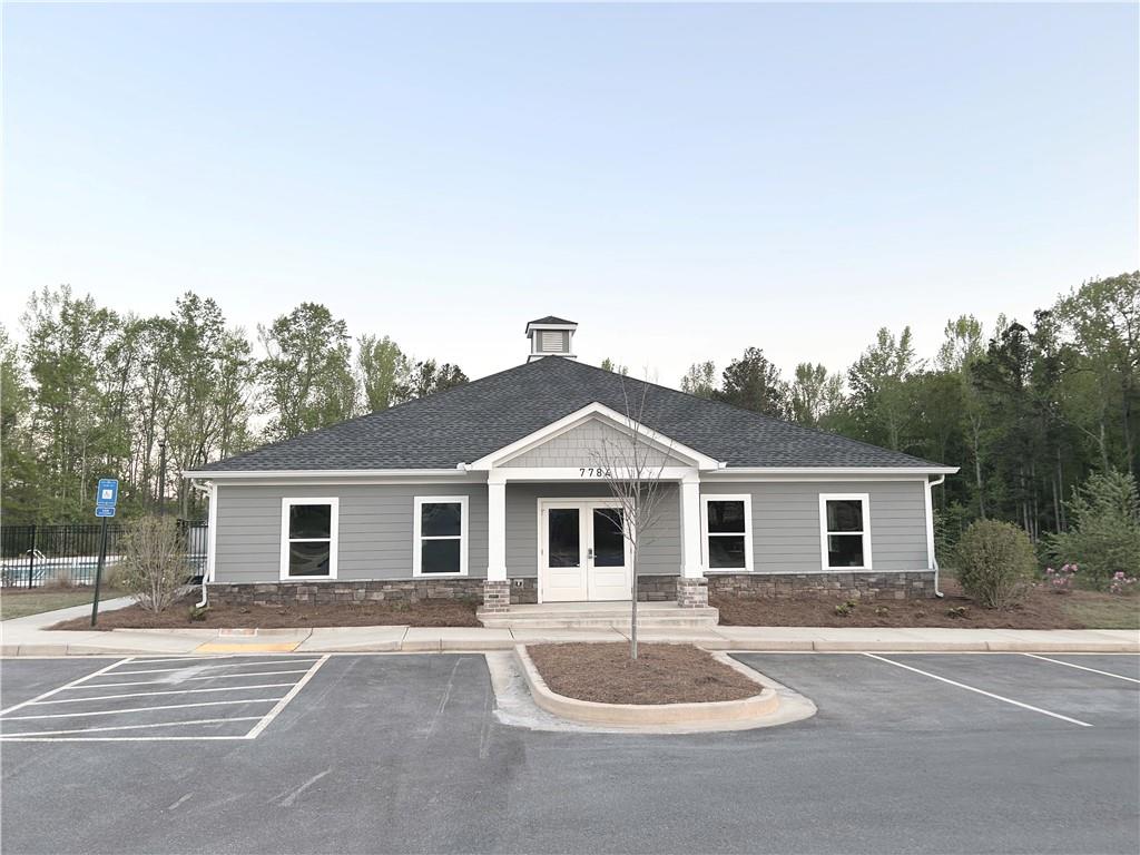 6901 Durham Lane Fairburn, GA 30213 - Photo 26 of 29 a front view of a house with a yard