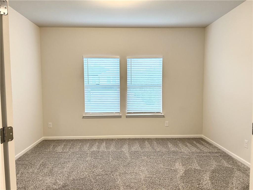 6901 Durham Lane Fairburn, GA 30213 - Photo 9 of 29 a view of a window in an empty room