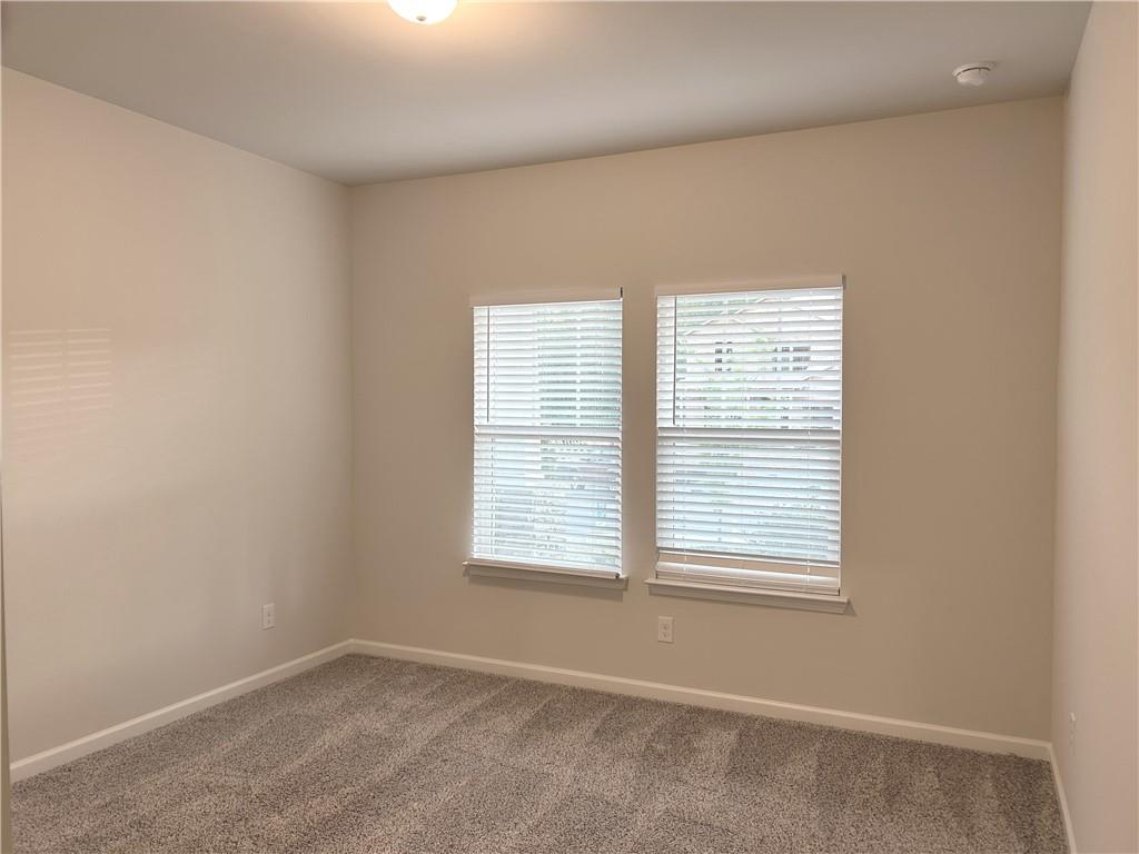 6901 Durham Lane Fairburn, GA 30213 - Photo 10 of 29 a view of an empty room with a window