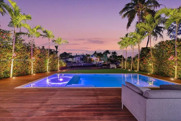 a view of outdoor space and swimming pool