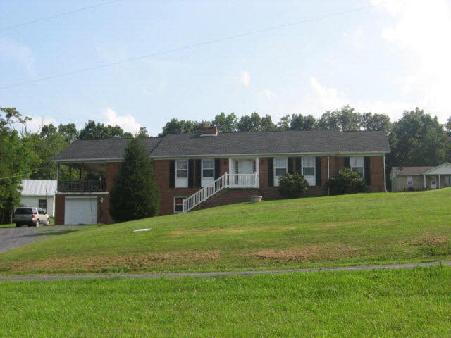 738 Conicville Road Mount Jackson, VA 22842 - Photo 1 of 5 a front view of house with yard and green space
