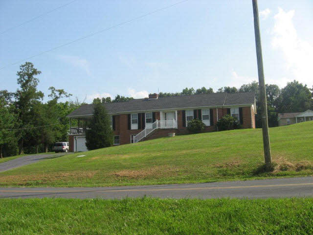 738 Conicville Road Mount Jackson, VA 22842 - Photo 5 of 5 a front view of a house with a yard