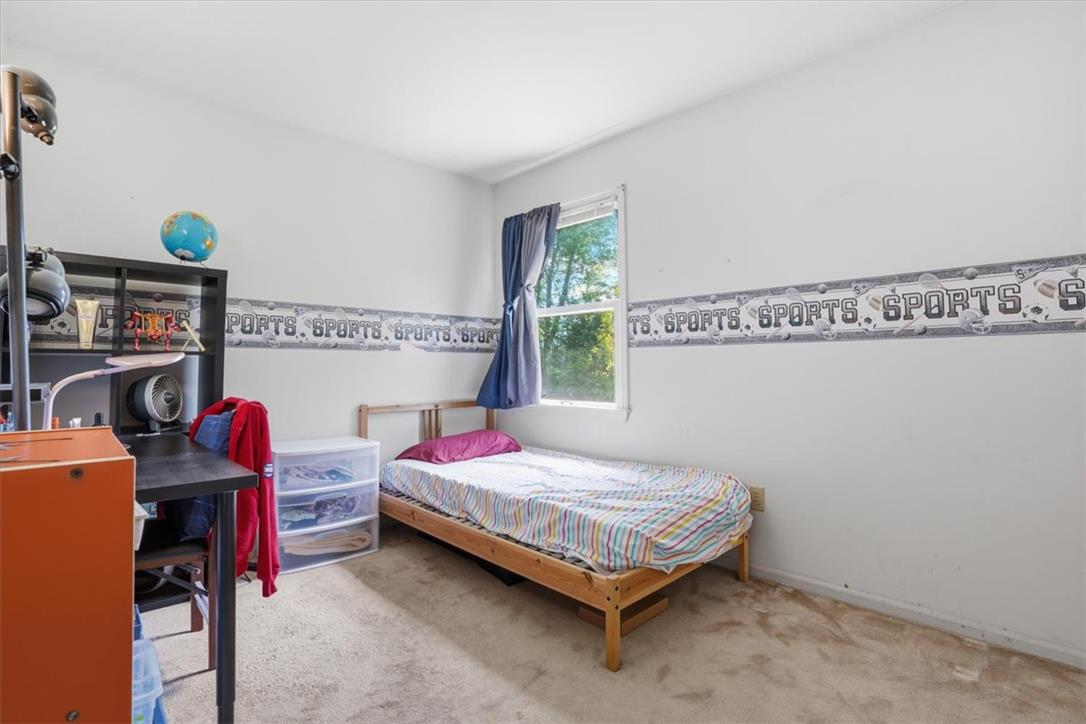 808 Hunter Road Easton, PA 18040 - Photo 22 of 41 A well-lit bedroom provides a comfortable retreat with plush carpeting and natural light.