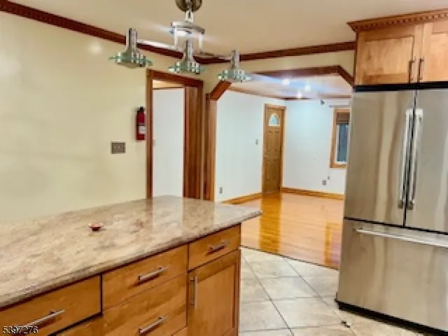 a view of a storage and utility room with closet