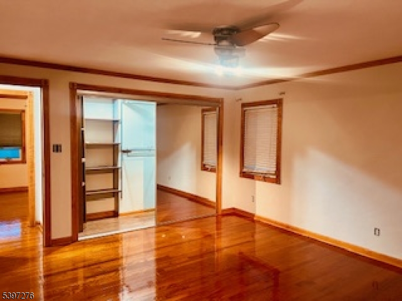 3 Freeman Place Nutley, NJ 07110 - Photo 5 of 12 wooden floor in an empty room