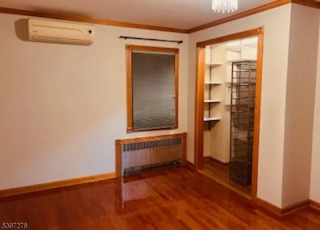 a view of front door and bedroom