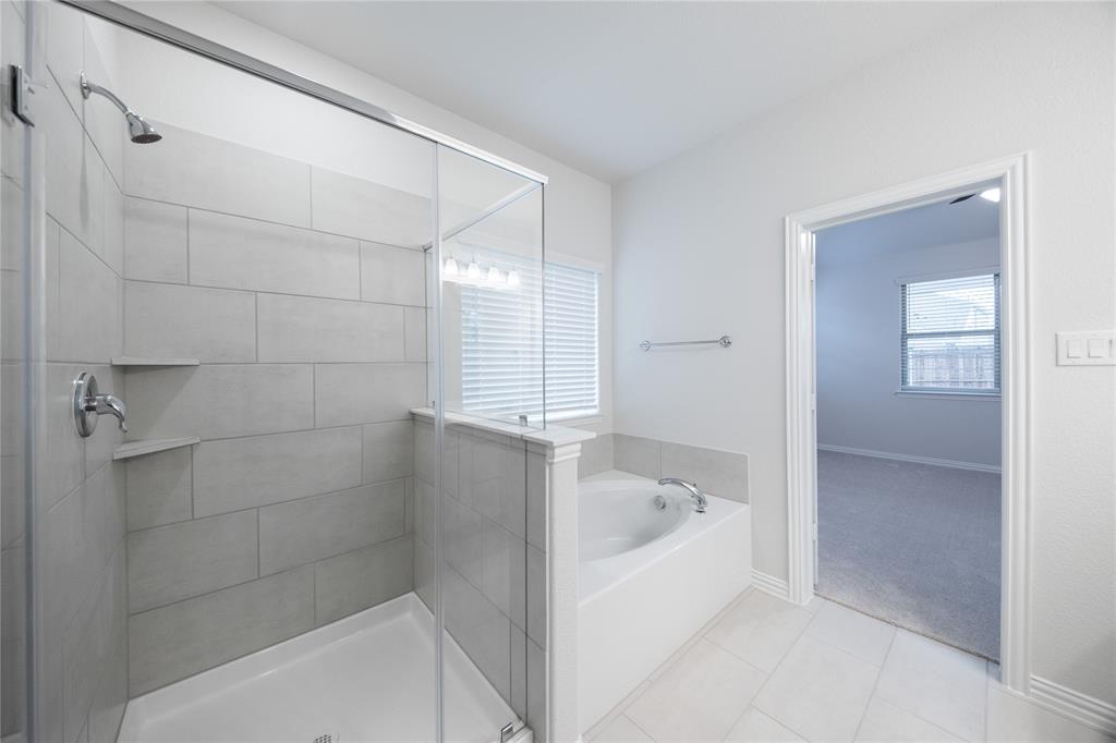 2606 Hawkins Street Anna, TX 75409 - Photo 16 of 31 a bathroom with a bathtub