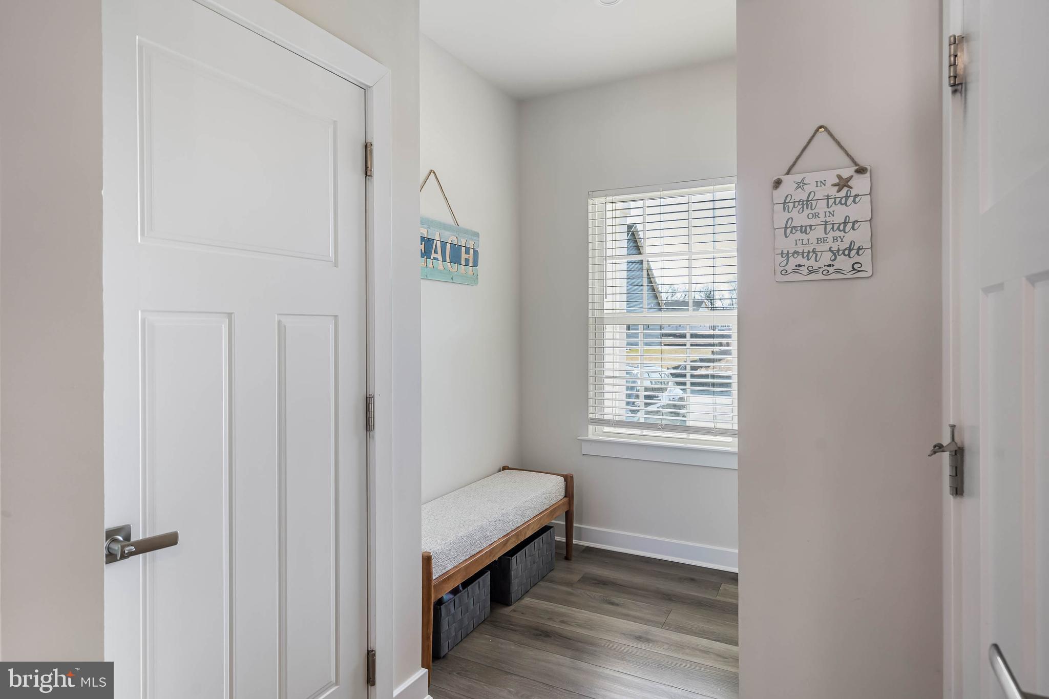 19079 Trimaran Drive Lewes, DE 19958 - Photo 25 of 61 a bathroom with a window and a shower