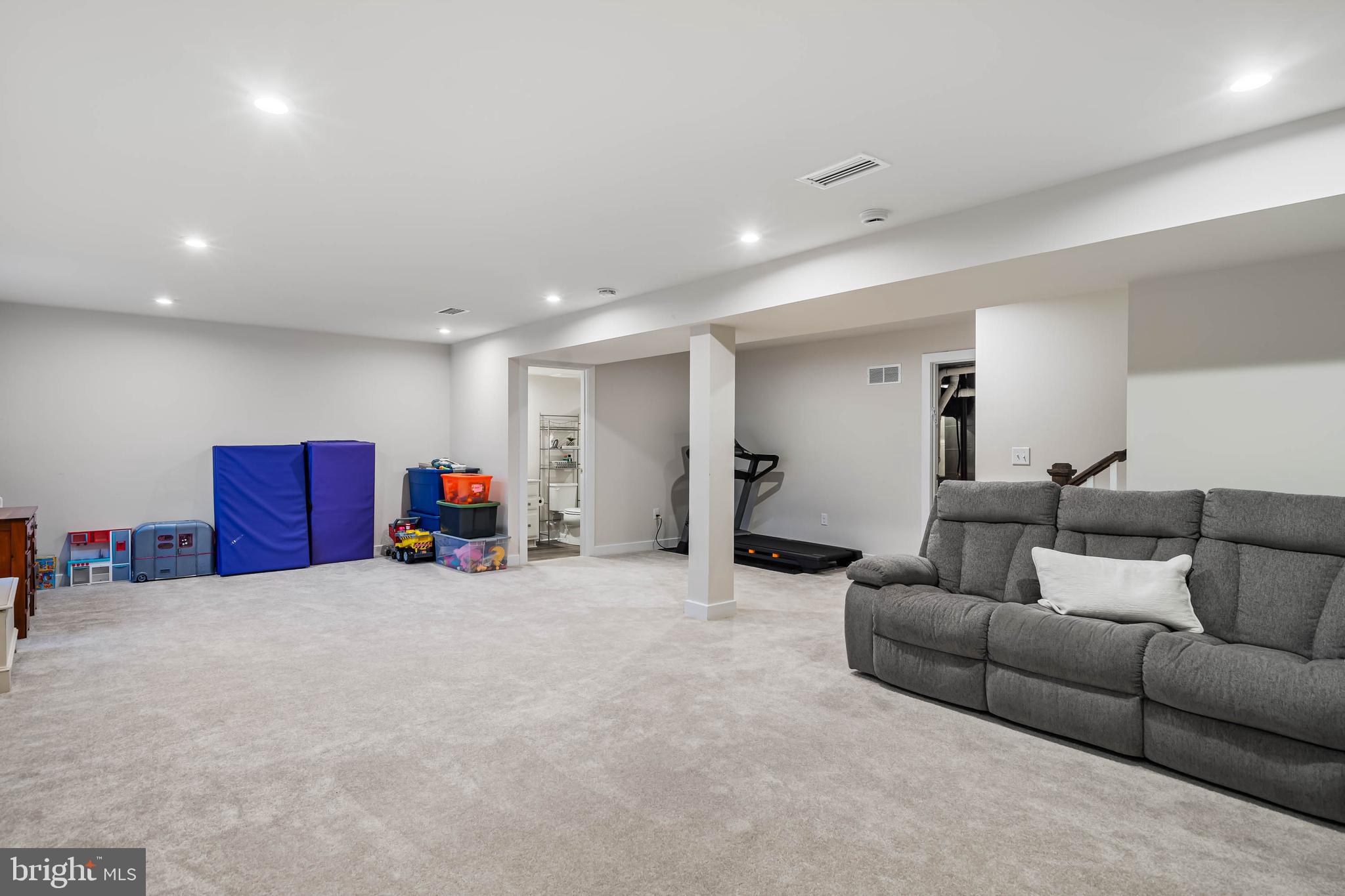 19079 Trimaran Drive Lewes, DE 19958 - Photo 42 of 61 a living room with furniture and a couch