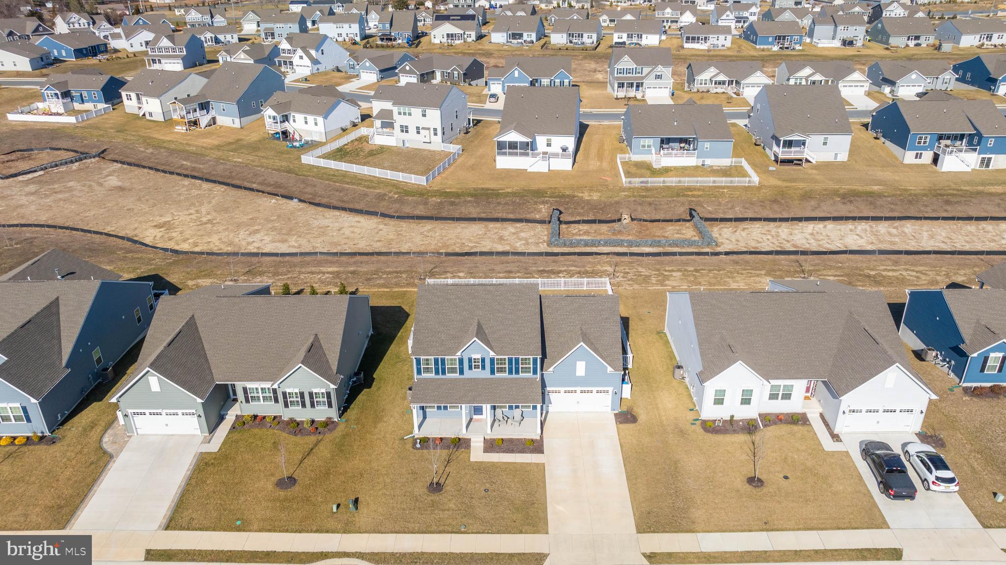 19079 Trimaran Drive Lewes, DE 19958 - Photo 49 of 61 an aerial view of residential houses with outdoor space