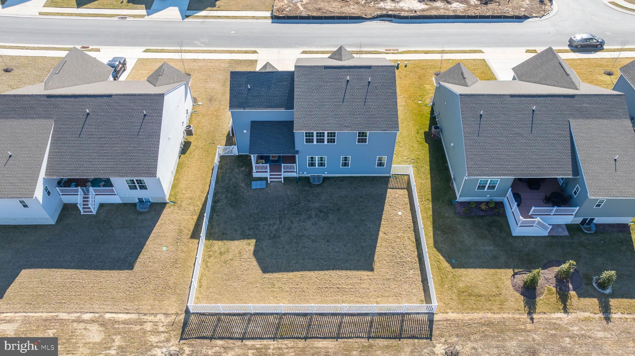 19079 Trimaran Drive Lewes, DE 19958 - Photo 5 of 61 an aerial view of residential houses with outdoor space