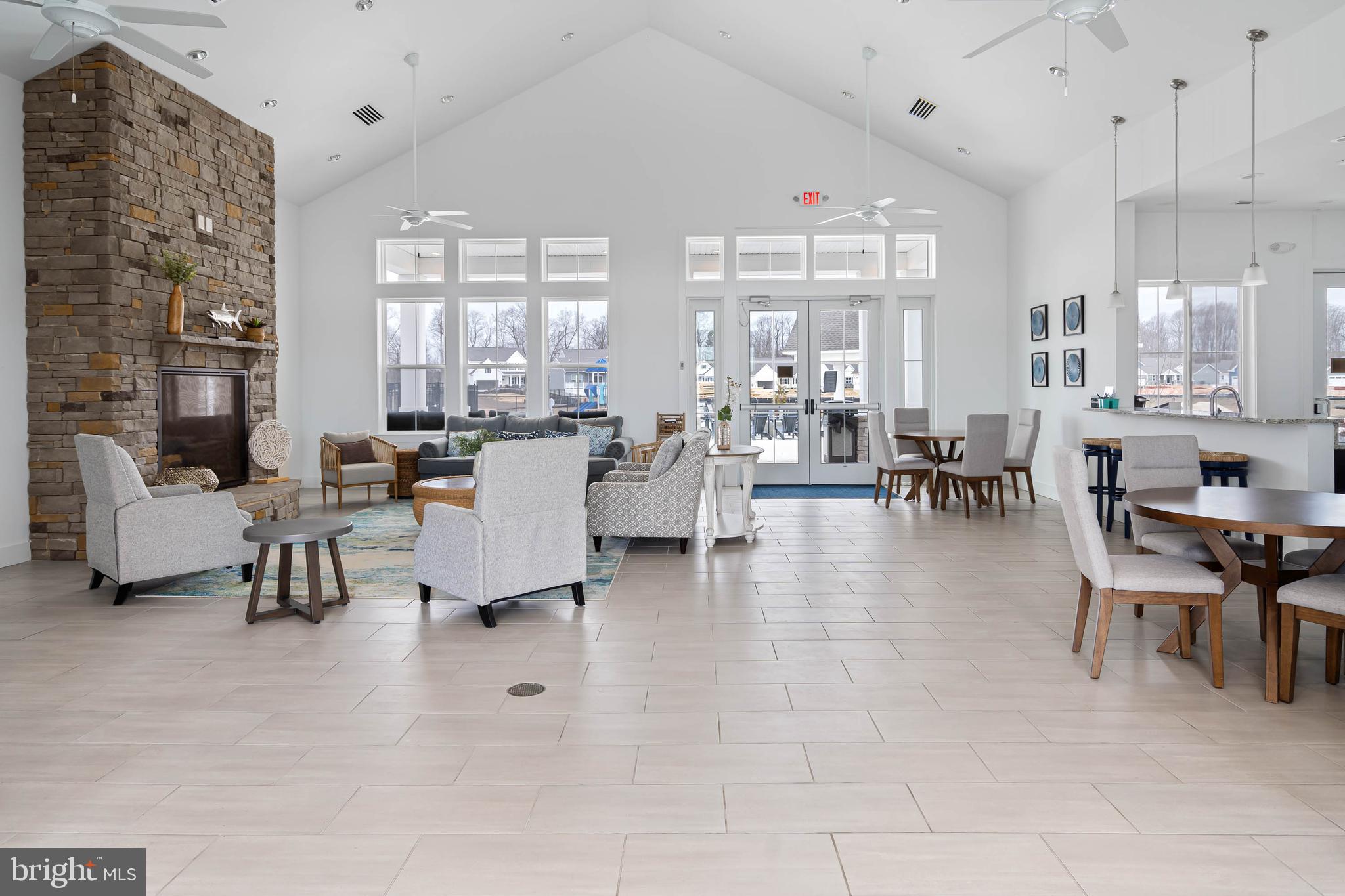 19079 Trimaran Drive Lewes, DE 19958 - Photo 58 of 61 a living room with furniture and a large window