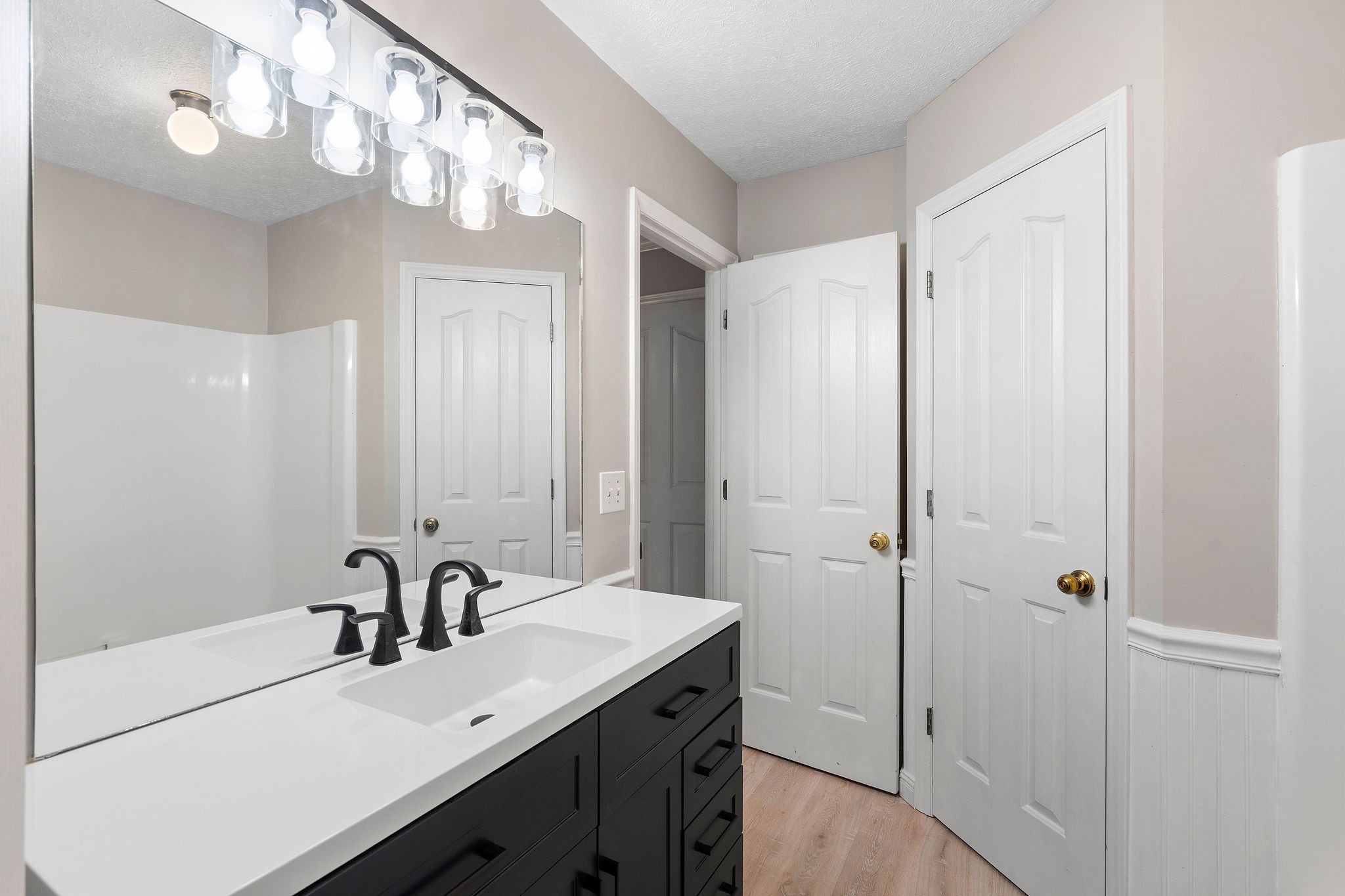 111 Slidell Court Rockvale, TN 37153 - Photo 17 of 27 a bathroom with a sink a mirror and a shower