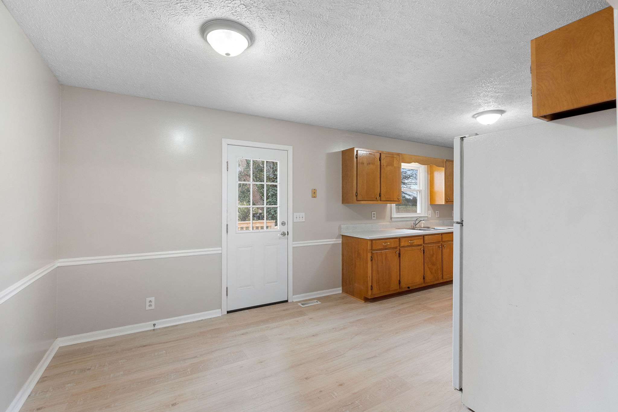 111 Slidell Court Rockvale, TN 37153 - Photo 8 of 27 an empty room with a fireplace and window