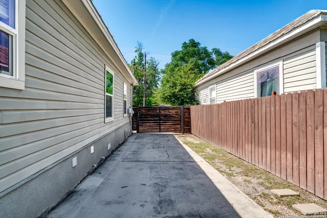a view of a back yard of the house