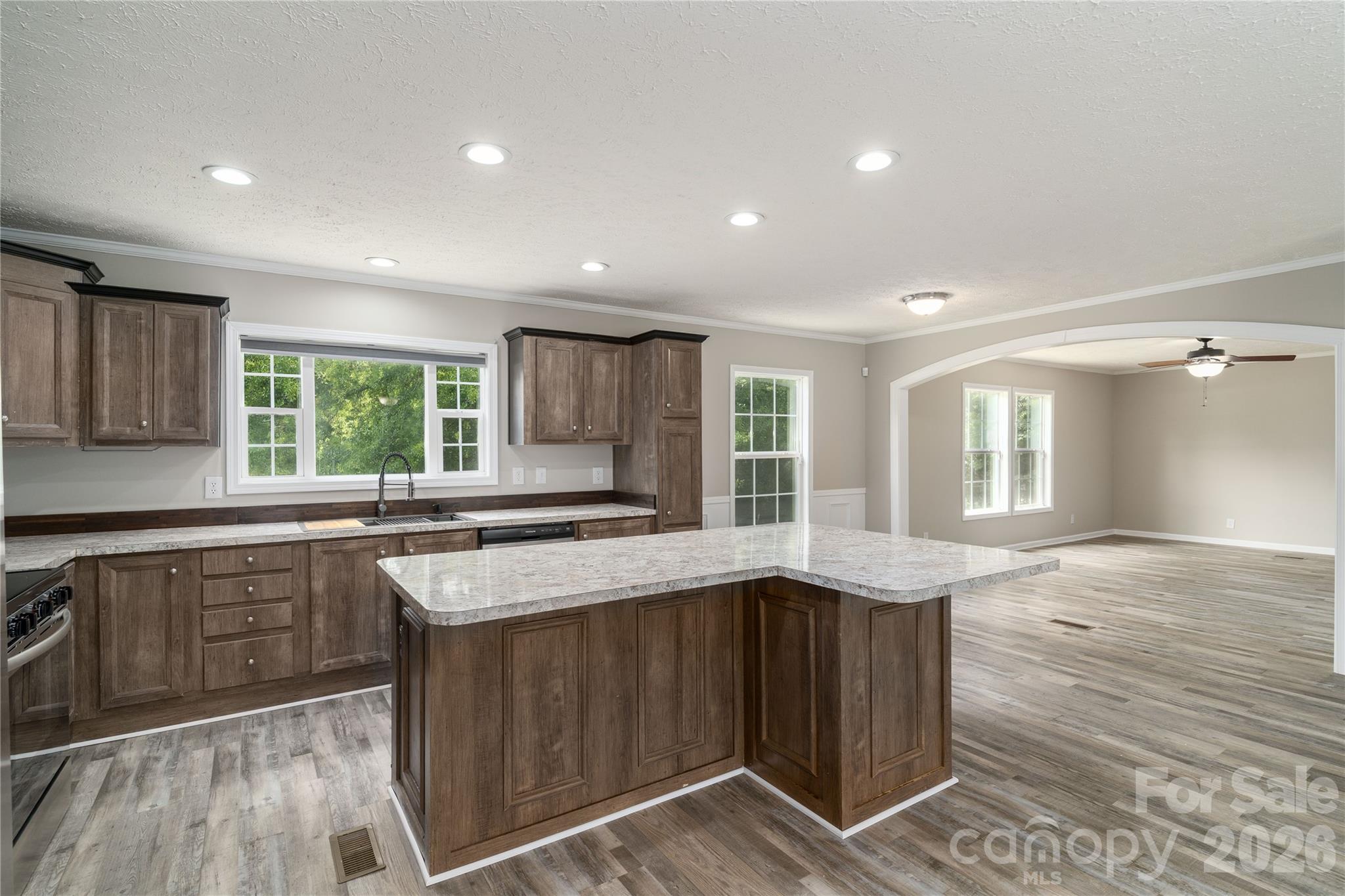 922 Lavender Road Grover, NC 28073 - Photo 15 of 43 a kitchen with granite countertop a sink and cabinets