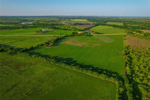 a view of a city with an ocean