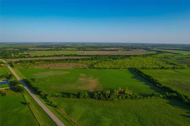 a view of a golf course with a lake