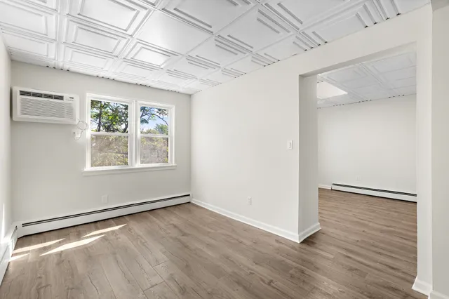 a view of livingroom with hardwood floor and hallway
