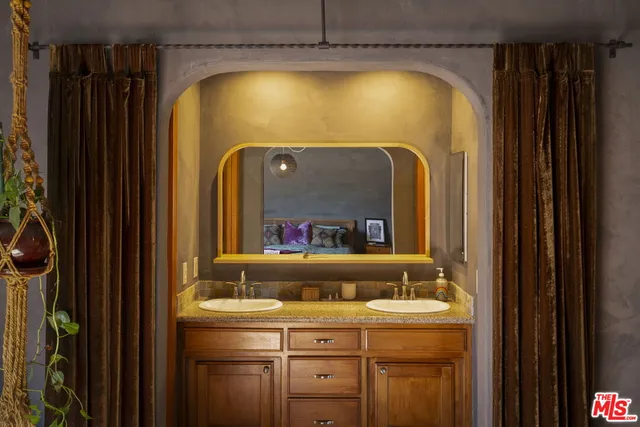 a bathroom with a mirror