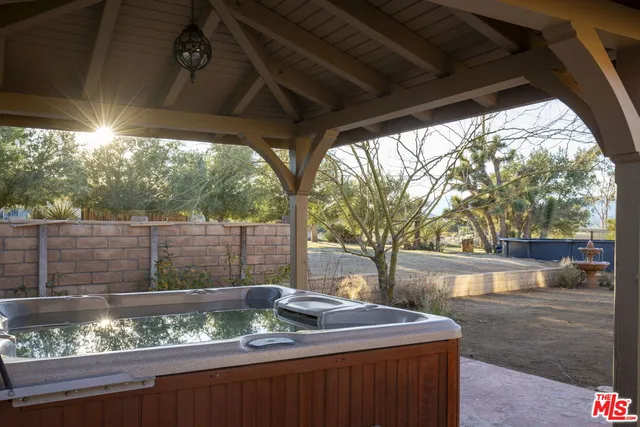 a view of backyard with green space