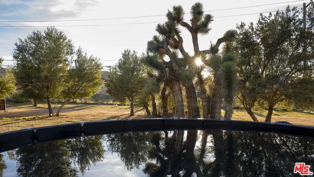 a view of a balcony with an outdoor space