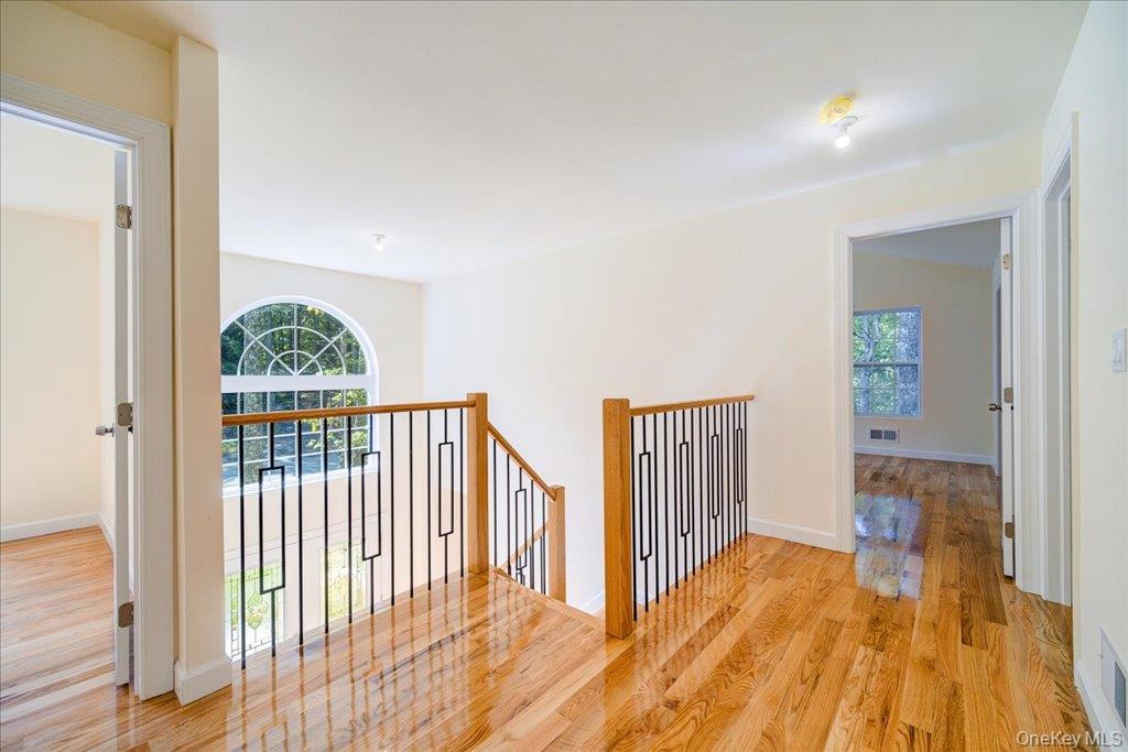 677 Marsh Road Glen Wild, NY 12738 - Photo 13 of 28 a view of a bedroom with wooden floor & fence