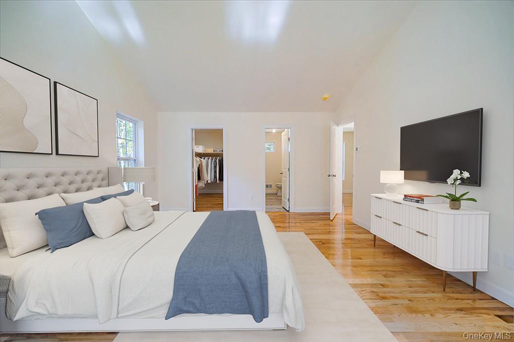 677 Marsh Road Glen Wild, NY 12738 - Photo 15 of 28 a bedroom with furniture and flat screen tv