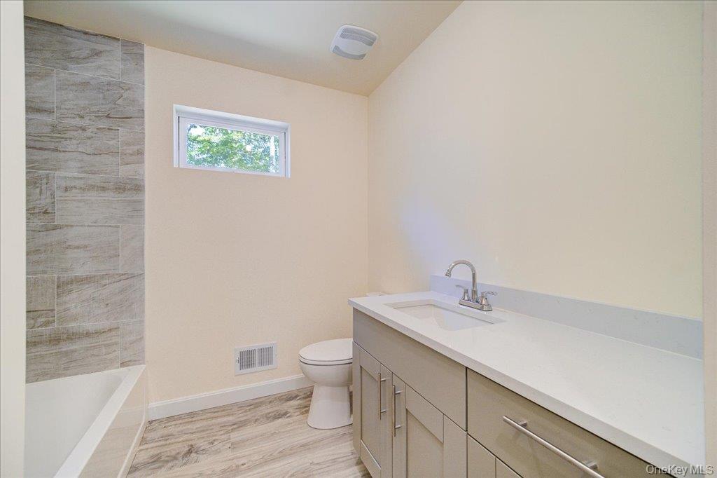 677 Marsh Road Glen Wild, NY 12738 - Photo 17 of 28 a bathroom with a sink a toilet and bathtub
