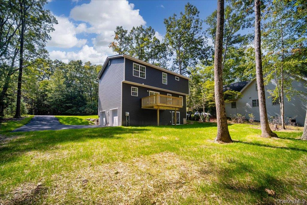 677 Marsh Road Glen Wild, NY 12738 - Photo 4 of 28 a view of a house with a swimming pool