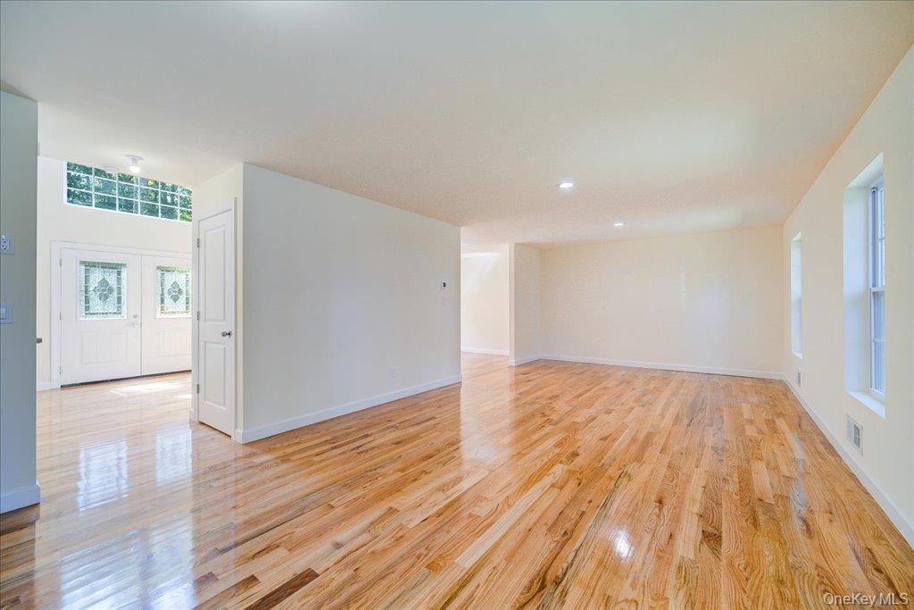 677 Marsh Road Glen Wild, NY 12738 - Photo 9 of 28 a view of empty room with wooden floor