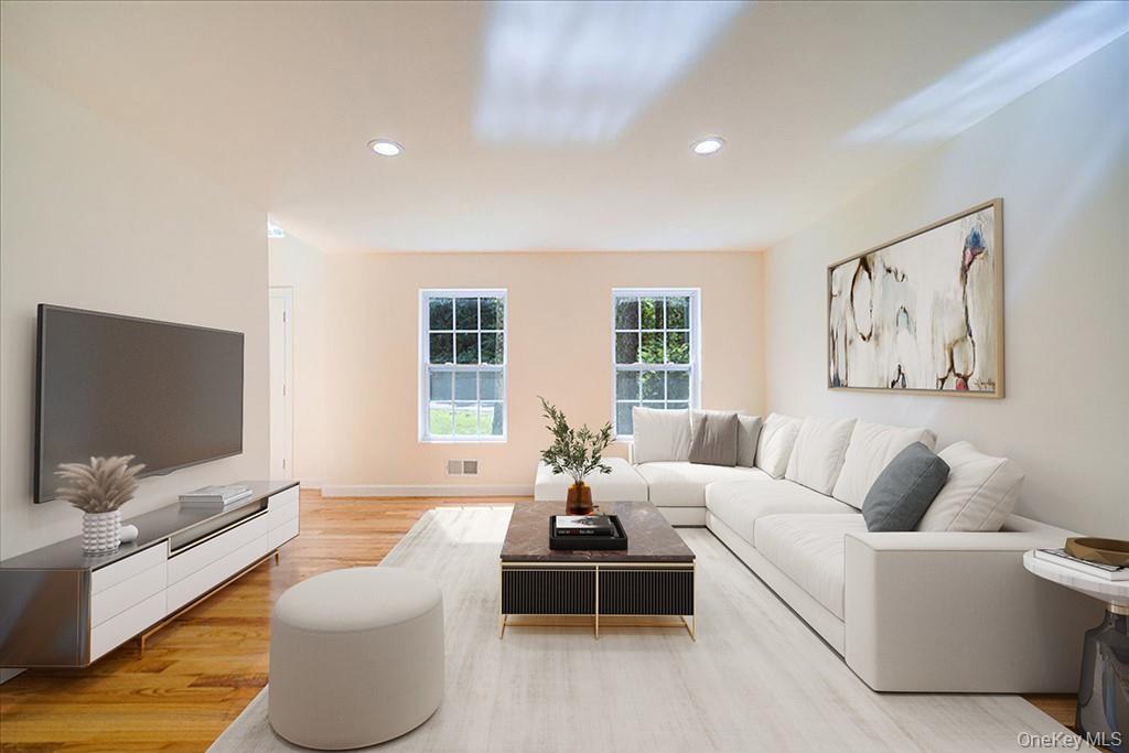 677 Marsh Road Glen Wild, NY 12738 - Photo 10 of 28 a living room with furniture and a flat screen tv