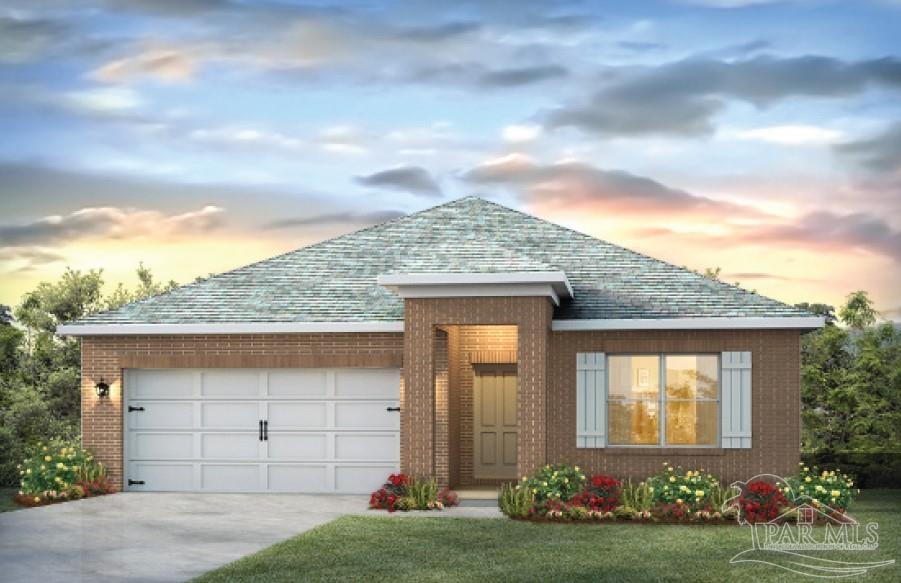 9736 Millee Loop Pensacola, FL 32526 - Photo 1 of 16 a front view of a house with a garden and garage