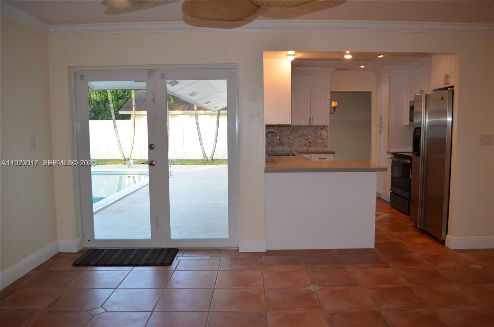 13491 Southwest 99th Terrace Miami, FL 33186 - Photo 21 of 41 a view of entryway with kitchen