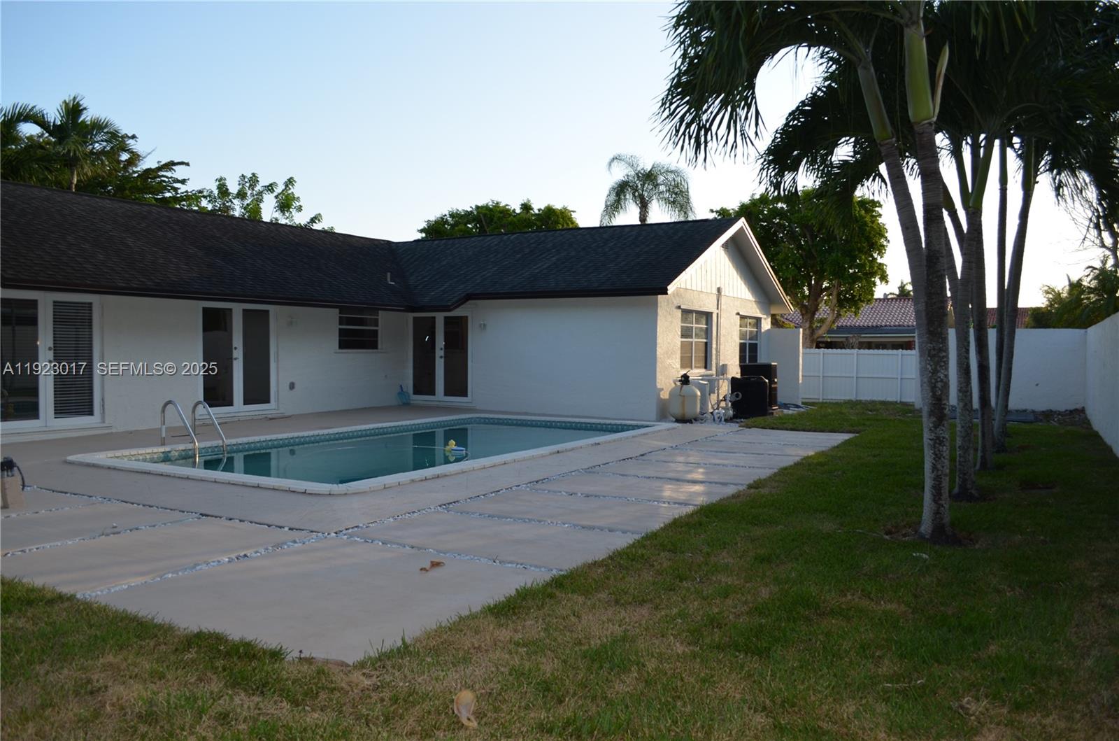 13491 Southwest 99th Terrace Miami, FL 33186 - Photo 26 of 41 front view of a house with a yard