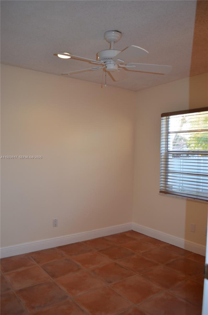 13491 Southwest 99th Terrace Miami, FL 33186 - Photo 30 of 41 a view of an empty room with a window