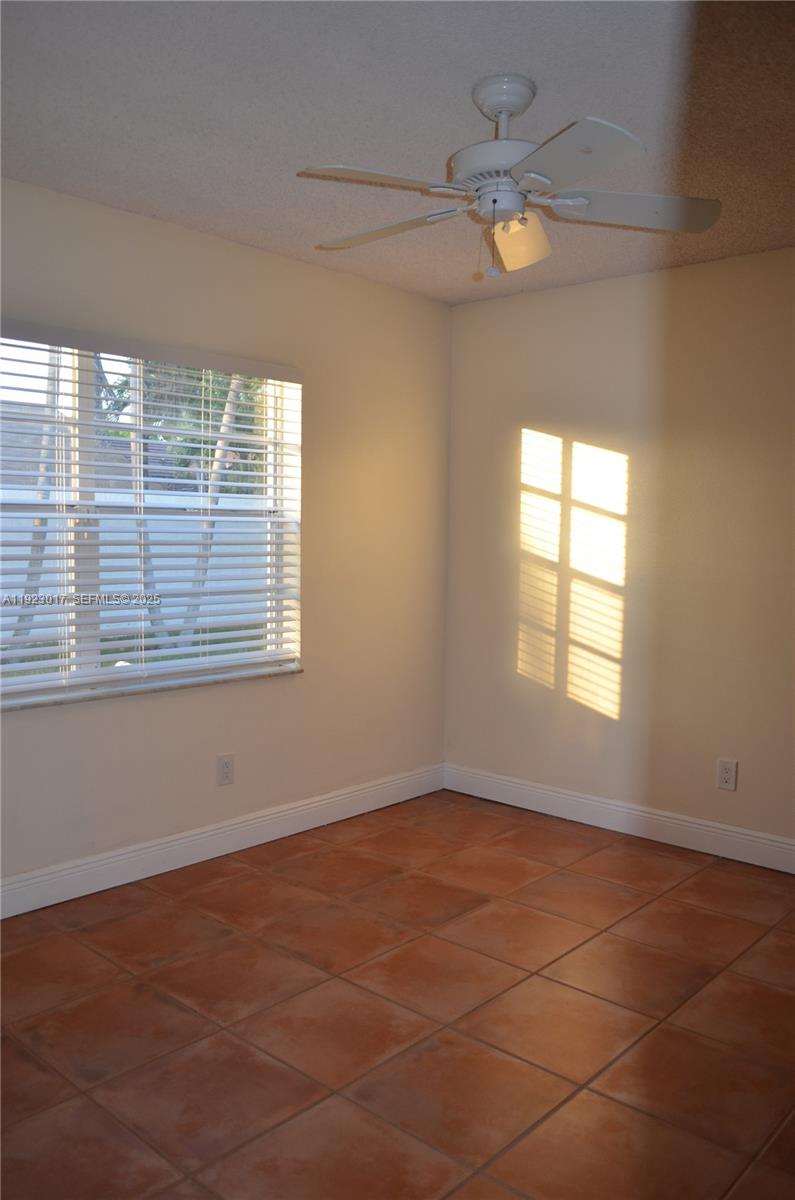13491 Southwest 99th Terrace Miami, FL 33186 - Photo 33 of 41 an empty room with a window